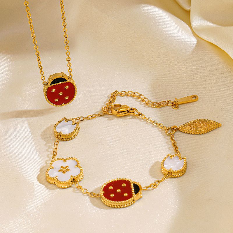 Pulsera De Acero Con Flor De Mariquita Y Siete Estrellas