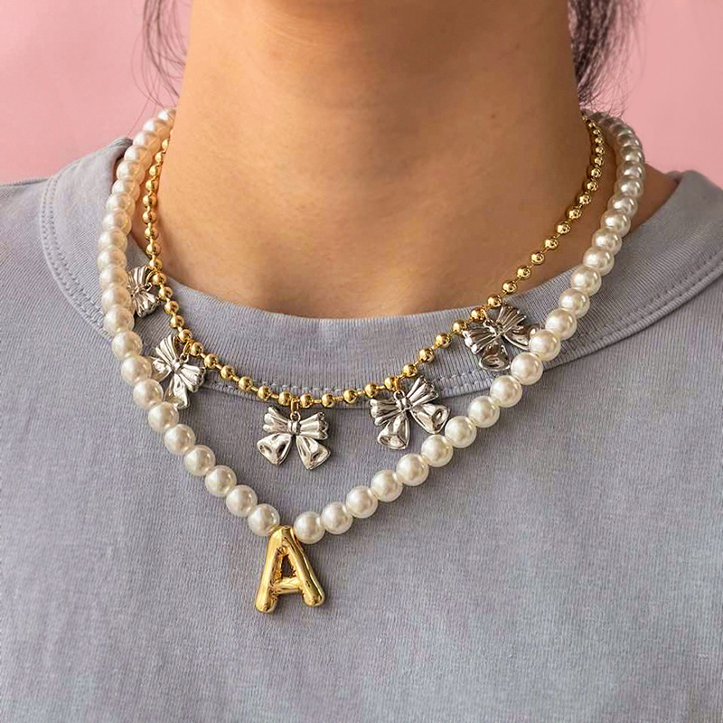 Fashion Gold Copper Bow Pendant Bead Necklace