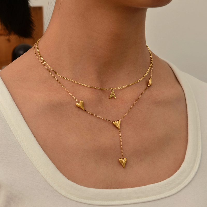 Collar Con Forma De Y Con Colgante De Amor De Acero De Titanio