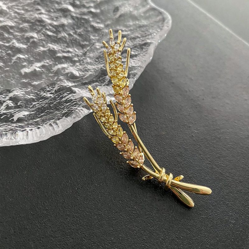 Broche Oreja De Trigo Con Circonio Y Incrustaciones De Cobre