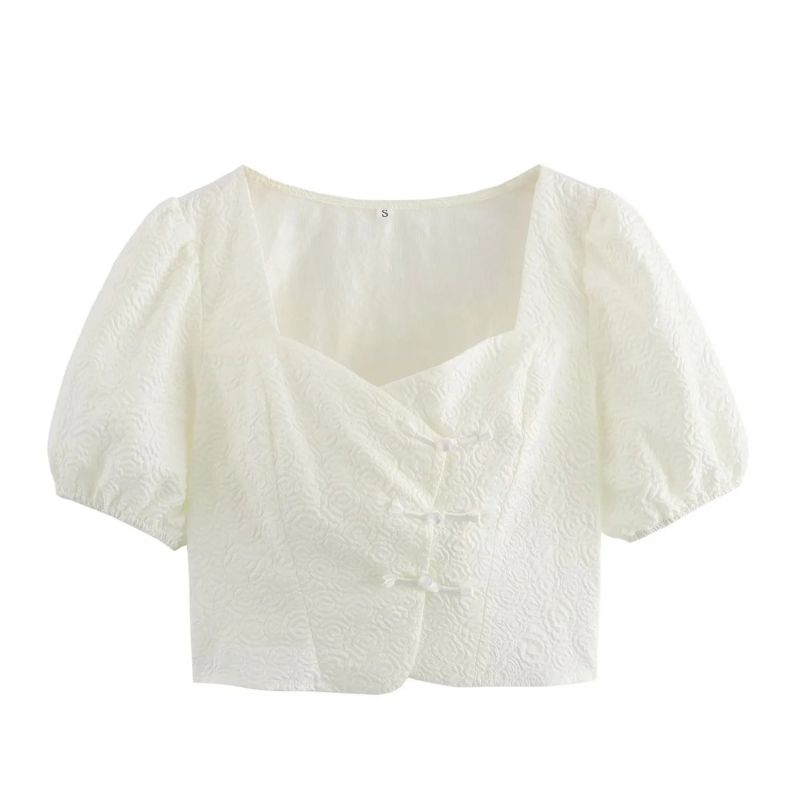 Top Con Mangas Abullonadas Y Botones En Relieve Texturizados