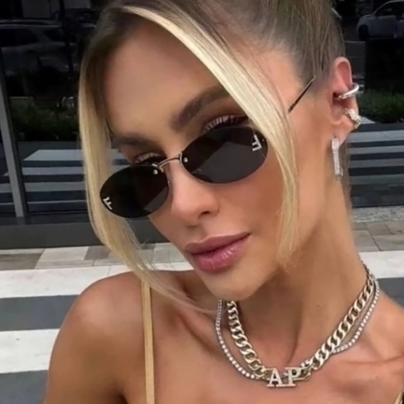 Gafas De Sol Ovaladas Con Borde Cortado Sin Marco