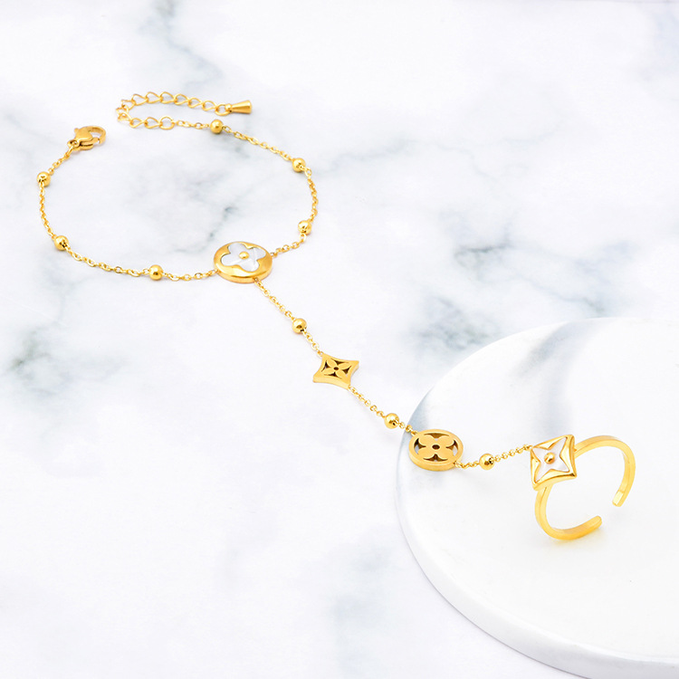 Fashion Gold Titanium Steel Four-leaf Flower Open Finger Bracelet