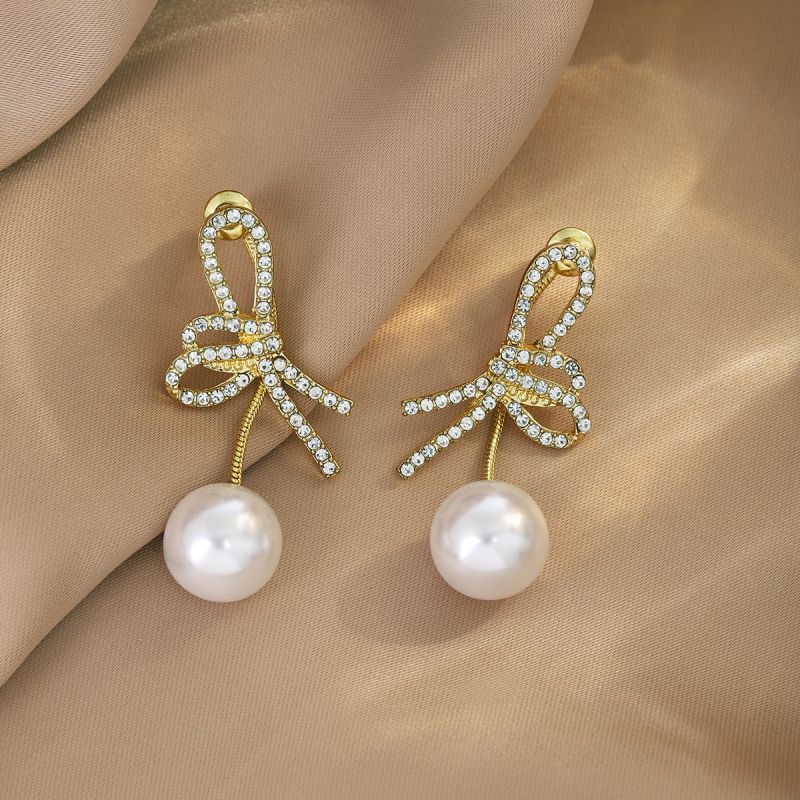 Fashion Gold Alloy Diamond Bow Pearl Earrings