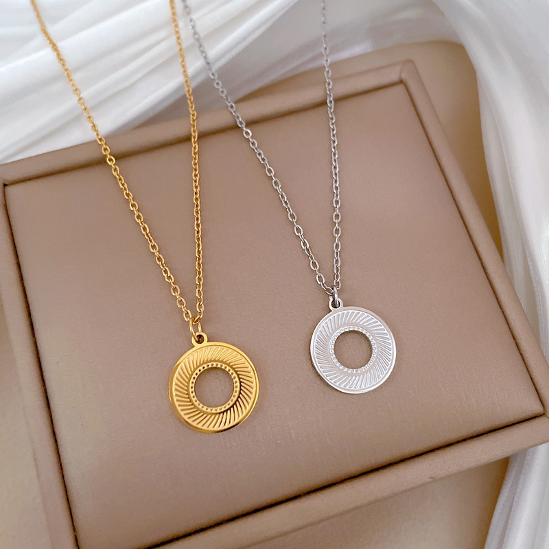 Gold Titanium Steel Rotating Ring Necklace