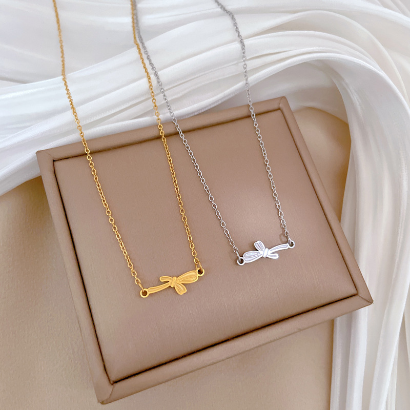 Gold Titanium Steel Bow Necklace