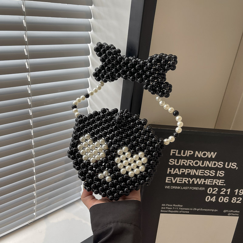 Black Pearl Woven Skull Crossbody Bag