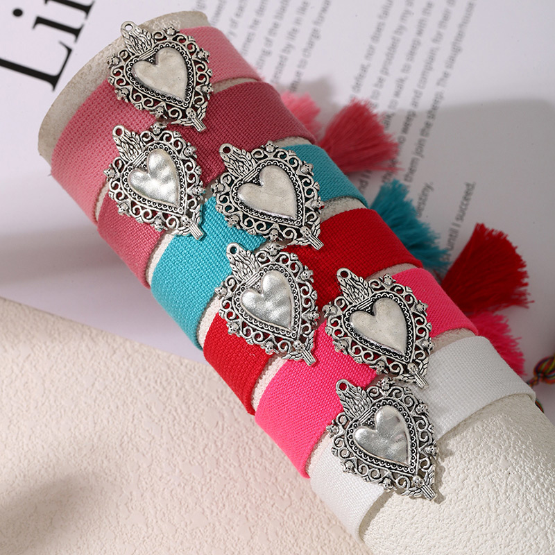 Lake Blue Alloy Pattern Heart Braided Tassel Bracelet