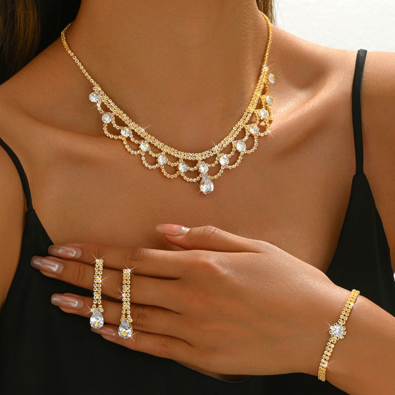 Gold Three Piece Set Metal Geometric Necklace Earrings And Bracelet Set With Diamonds