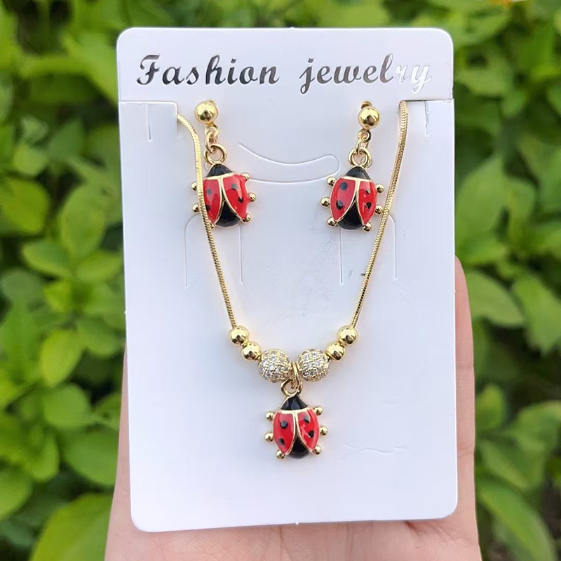 Conjunto De Collar Y Aretes Con Cuentas De Mariquita De Aceite Y Gota De Circonita En Engaste De Cobre (4 Mm)