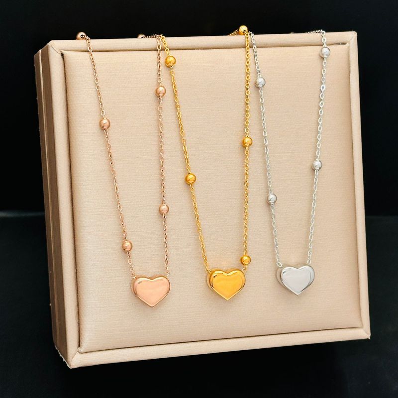 Pendientes De Corazón De Acero Y Titanio