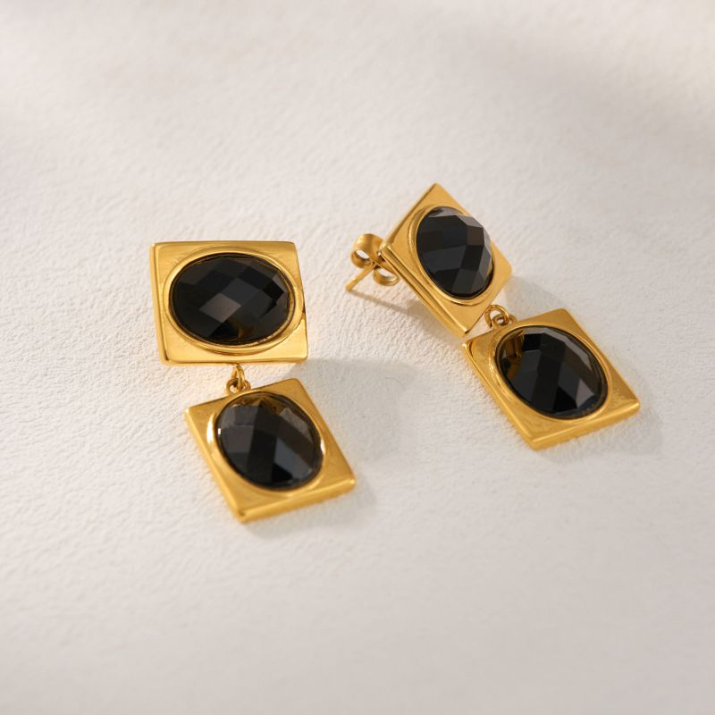Pendientes Ovalados De Acero De Titanio Con Diamantes.