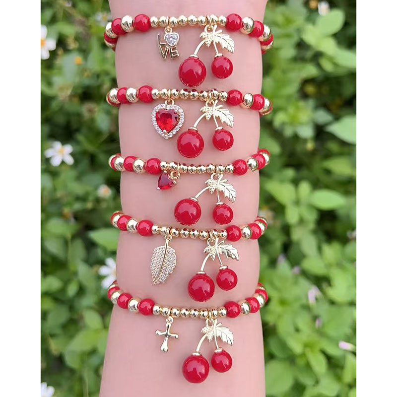 Pulsera Con Cruz De Hoja De Cerezo Y Corazón De Cuentas Doradas Y Bañada En Cobre