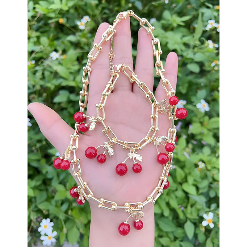 Pulsera De Cerezas De Cobre Bañada En Oro
