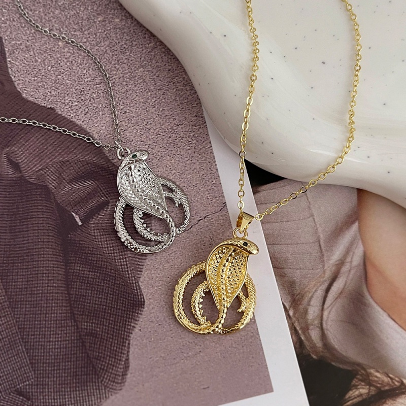 Gold Copper And Zircon Snake Necklace