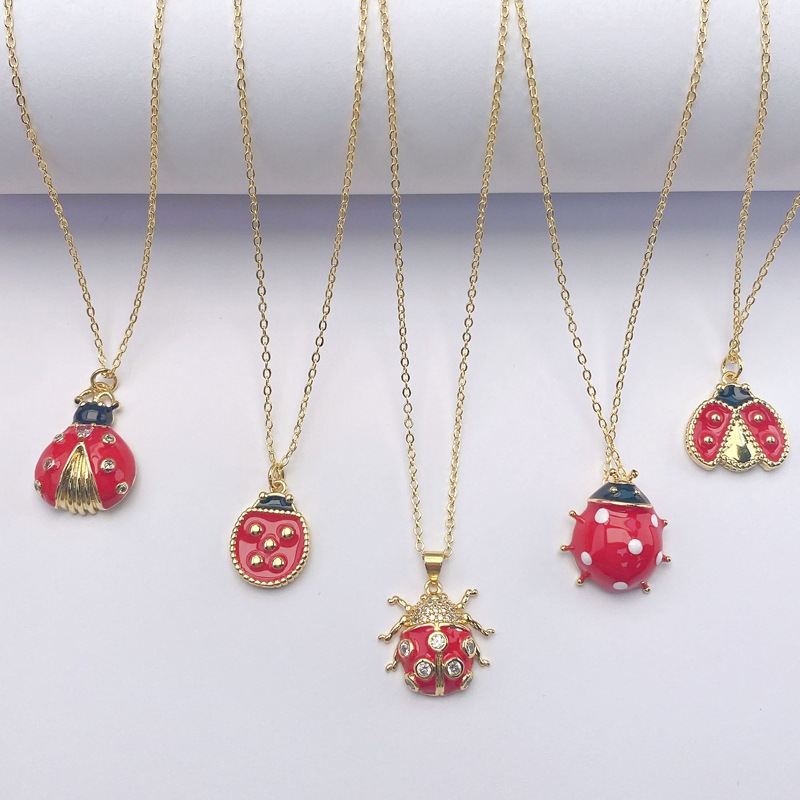 Conjunto De Anillo Collar Y Pendientes Con Diseño De Mariquita De Dibujos Animados Con Gotas De Aceite De Cobre