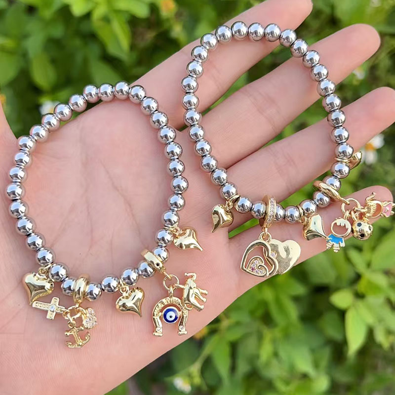 Steel Color 2 Gold-plated Copper Beaded Heart Football Bracelet