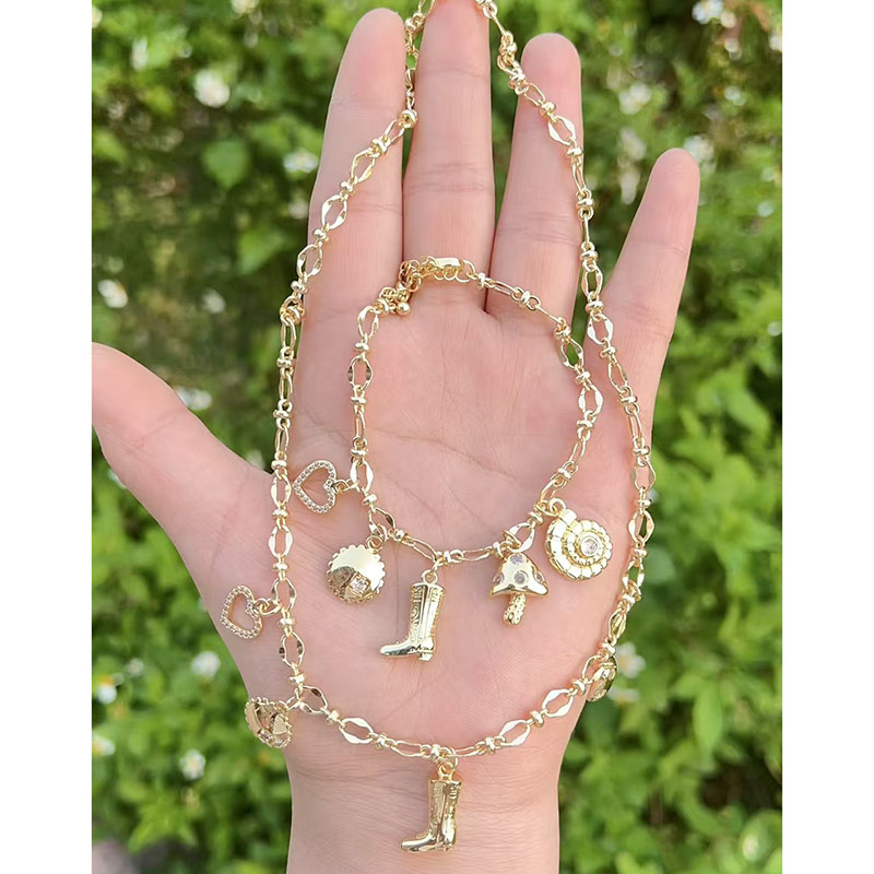 Pulsera Con Colgante De Corazón Caracola Y Hongo Bañada En Oro Y Cobre