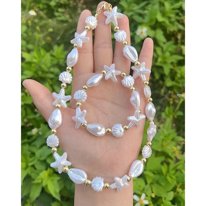 Pulsera De Concha De Estrella De Mar Con Perla Bañada En Oro Y Cobre
