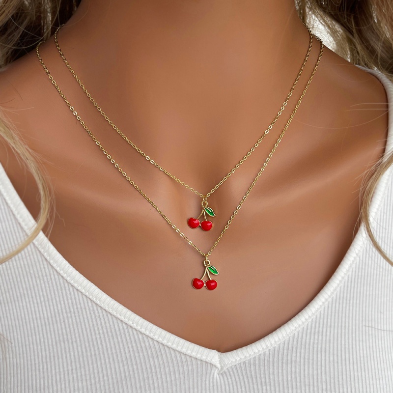 Collar De Cerezas Con Gotas De Aceite De Cobre