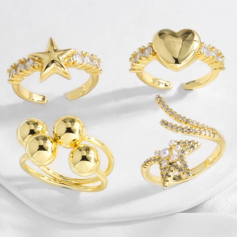 Anillo De Bola De Corazón Con Estrella De Cinco Puntas Y Diamantes Bañado En Oro Y Cobre