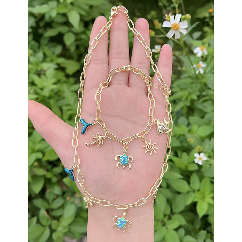 Pulsera Con Colgante Geométrico De Tortuga Y Pez Bañada En Oro Y Cobre