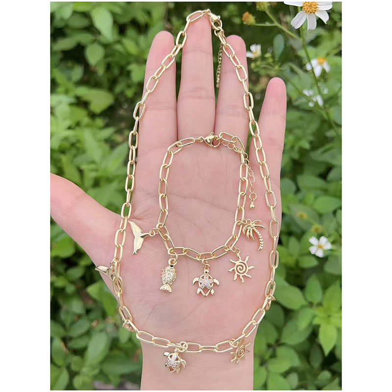 Pulsera Con Colgante Geométrico De Tortuga Y Pez Bañada En Oro Y Cobre