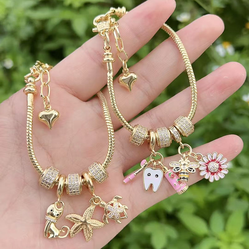 Pulsera De Estrella De Mar Y Tortuga Bañada En Oro Y Cobre