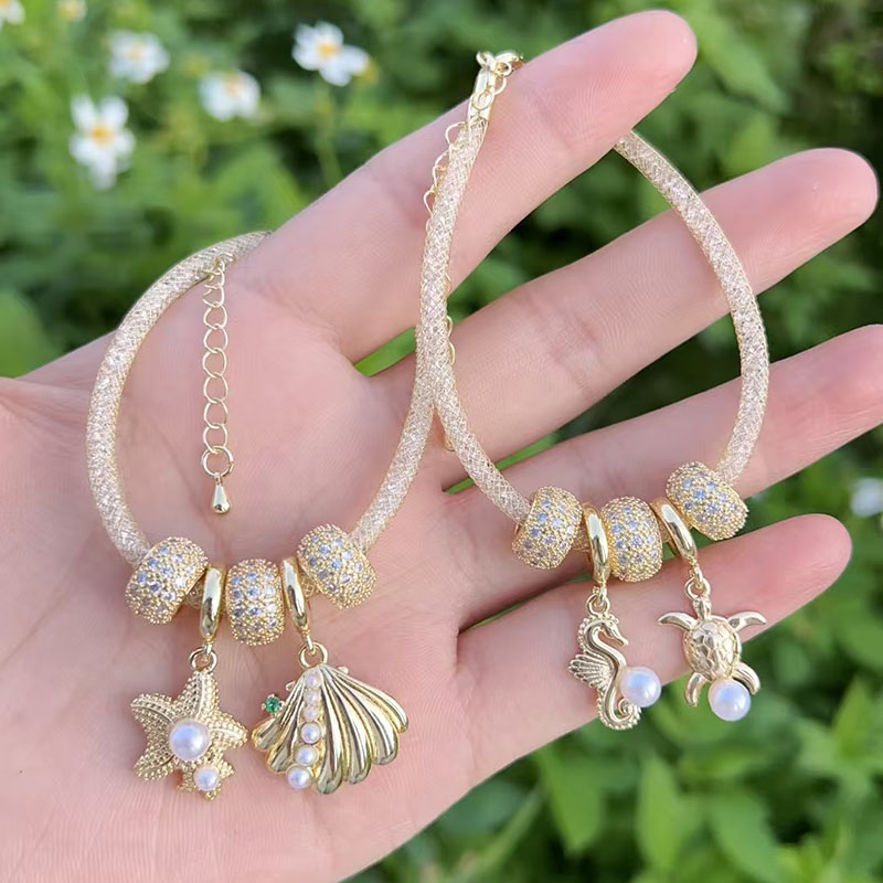 Pulsera De Estrella De Mar Con Concha De Perla Y Diamantes Bañada En Oro Y Cobre