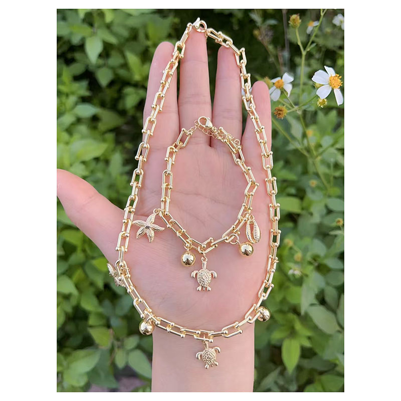 Pulsera De Tortuga Y Estrella De Mar De Cobre Bañada En Oro
