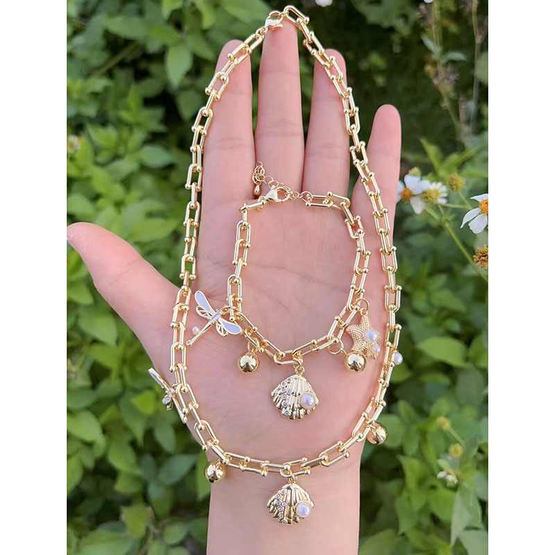 Pulsera De Estrella De Mar Con Concha De Perla Bañada En Oro Y Cobre