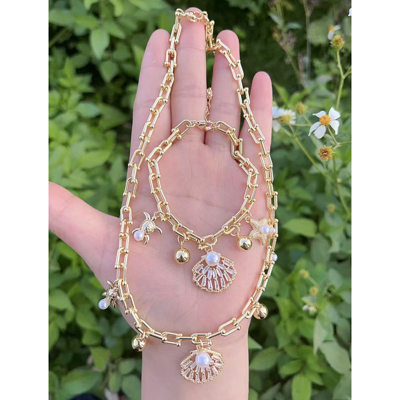 Pulsera De Concha De Perla Con Baño De Cobre Oro Y Diamantes