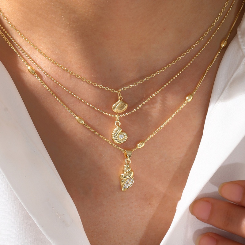 Gold 1 Copper Inlaid Zircon Conch Necklace (with Needle)