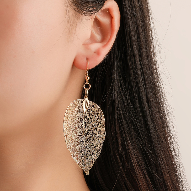 Gold Alloy Hollow Leaf Earrings
