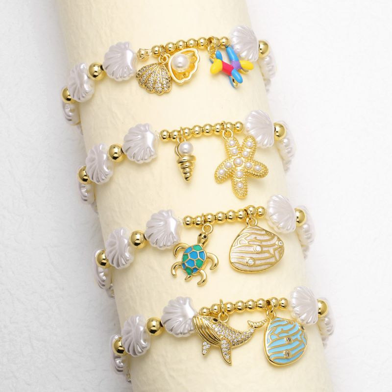 Pulsera De Cuentas De Concha Tortuga Estrella De Mar Globo Y Perro Bañada En Cobre Y Oro
