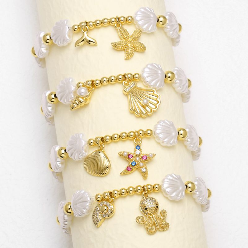 Pulsera De Pulpo Estrella De Mar Y Concha Bañada En Cobre Y Oro