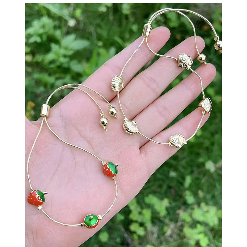 Pulsera De Fresa Con Concha De Cobre