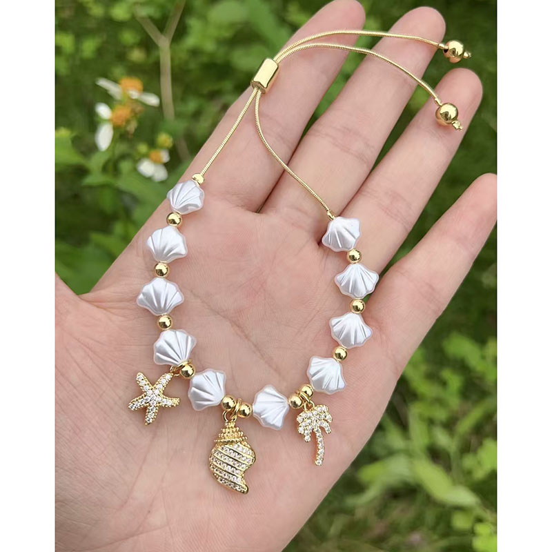 Pulsera De Concha De Perla De Cobre Con Diamantes Y Estrella De Mar