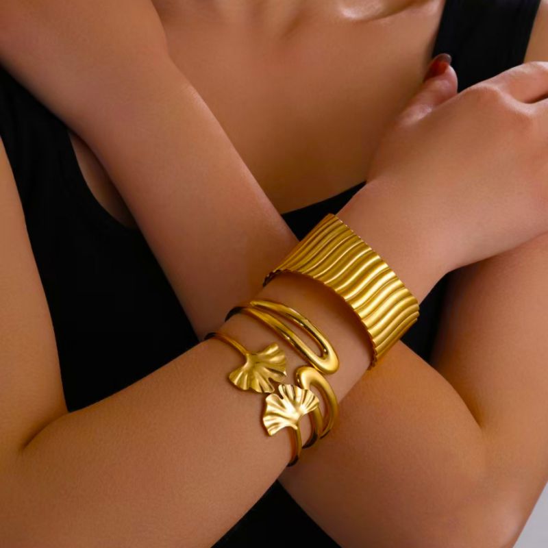 Steel + Hollow Titanium Steel Ginkgo Leaf Wave Hollow Bracelet