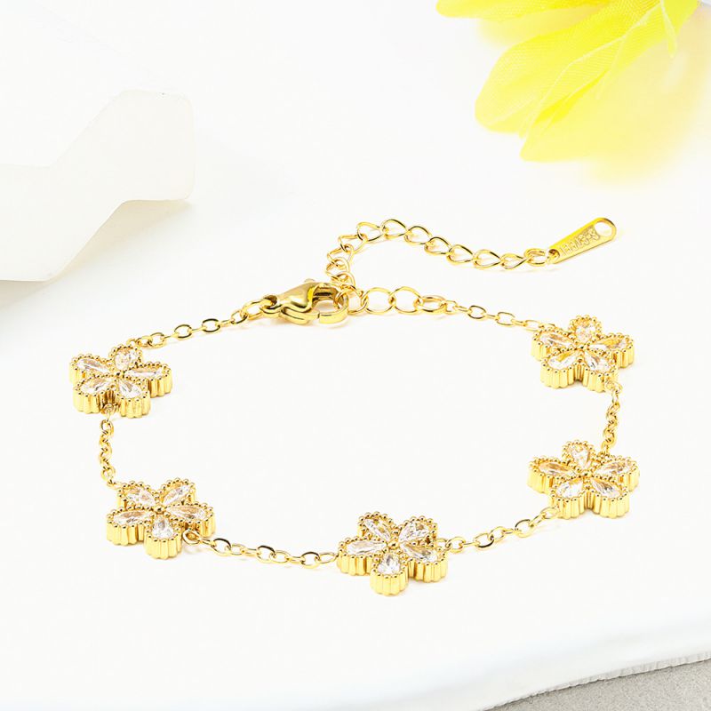 Conjunto De Collar Pulsera Y Pendientes Con Flores De Diamantes Y Acero De Titanio.