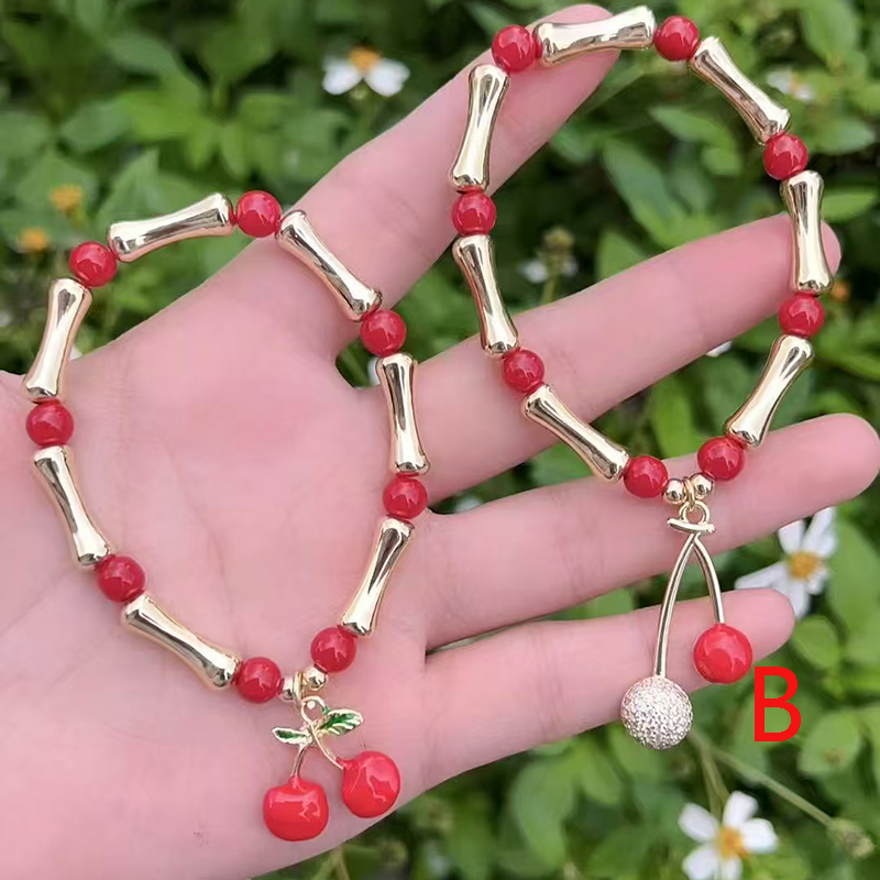 Pulsera De Cerezas Con Cuentas En Los Nudillos De Cobre Bañada En Oro