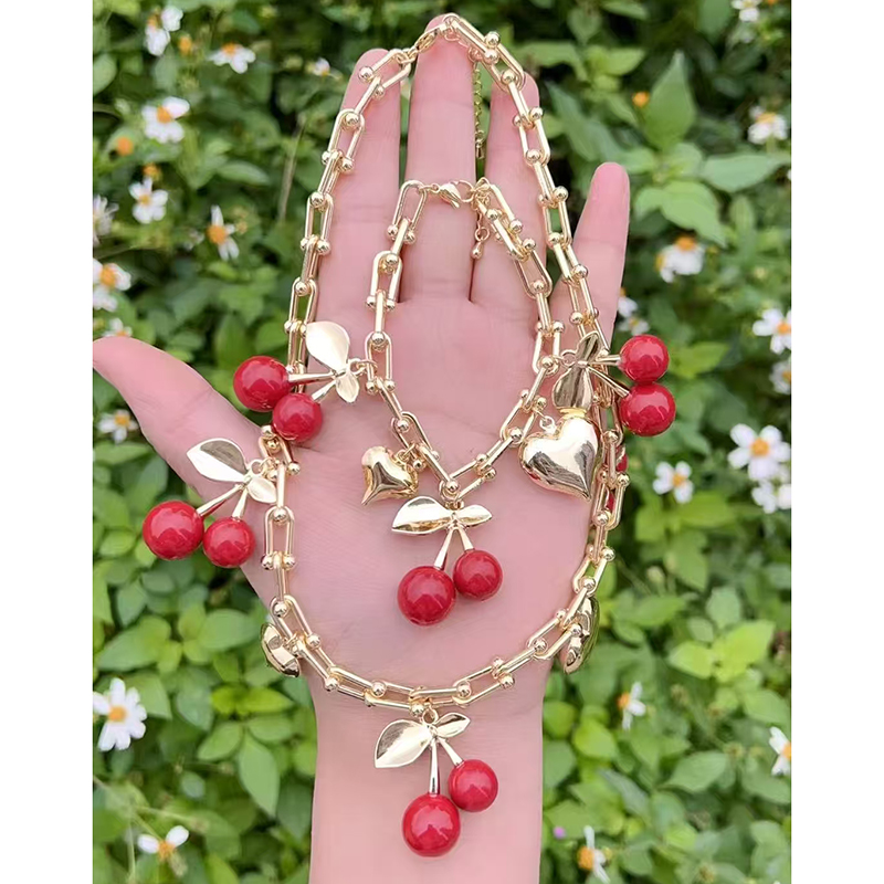 Pulsera De Cerezas De Cobre Bañada En Oro