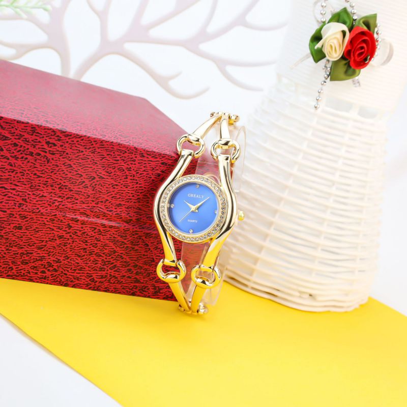 Reloj Redondo De Acero Inoxidable Con Diamantes