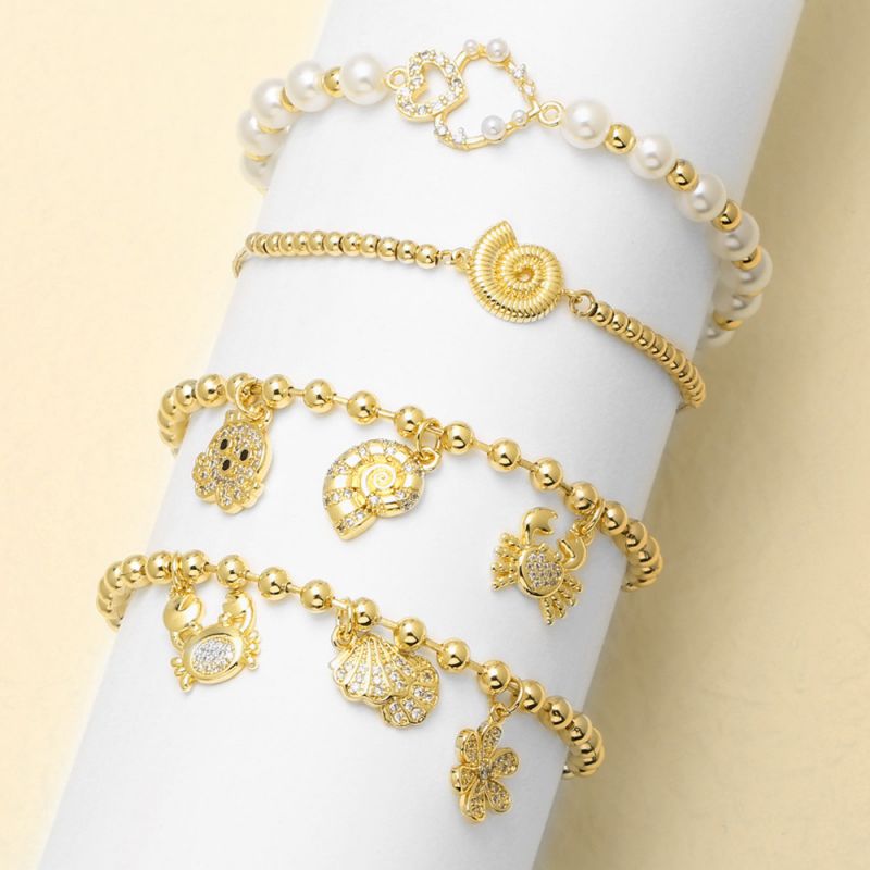 Pulsera Geométrica De Caracola Bañada En Oro Y Cobre