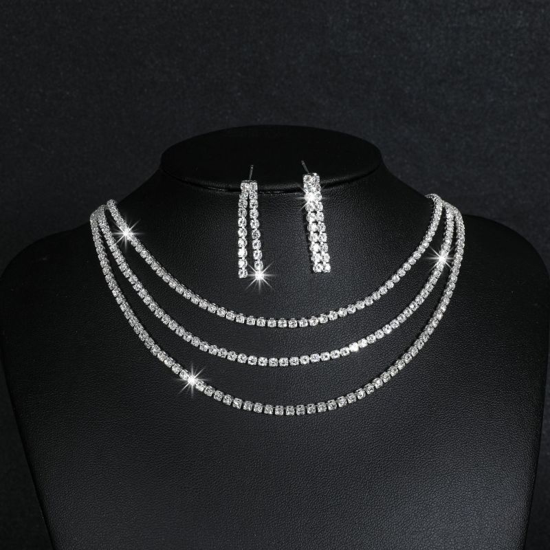Conjunto De Collar Y Pendientes Dobles Con Cadena De Garra De Diamante