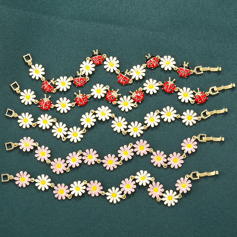 Pulsera De Margaritas Con Gotas De Aceite De Colores