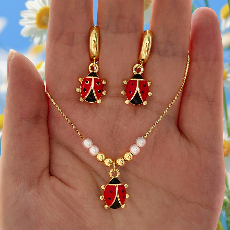 Pendientes De Mariquita Con Gotas De Aceite De Cobre