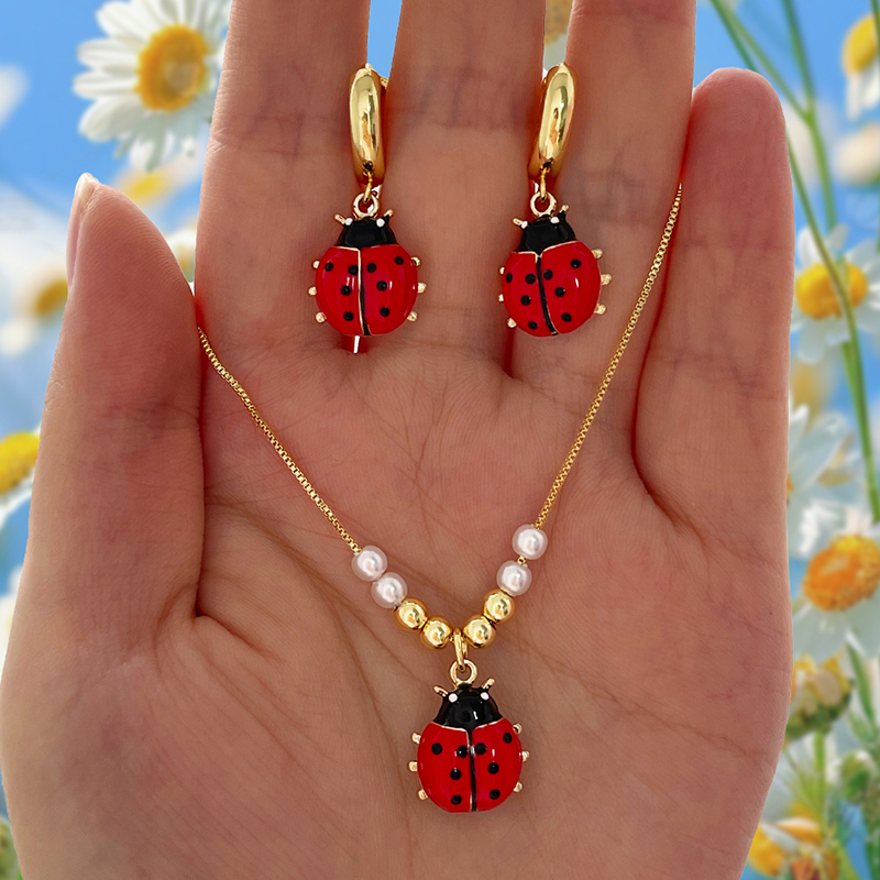 Pendientes De Mariquita Con Gotas De Aceite De Cobre
