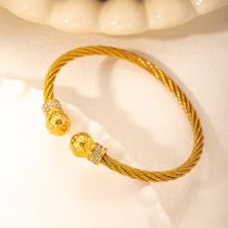Pulsera Redonda De Acero Y Titanio Con Diseño Giratorio